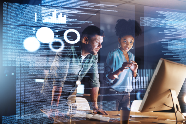 Man and woman looking at screen with insights overlay